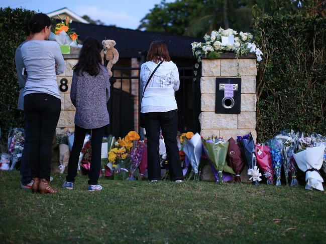 Members of the Columbian community gather outside the home in Davidson. Picture: Craig Greenhill