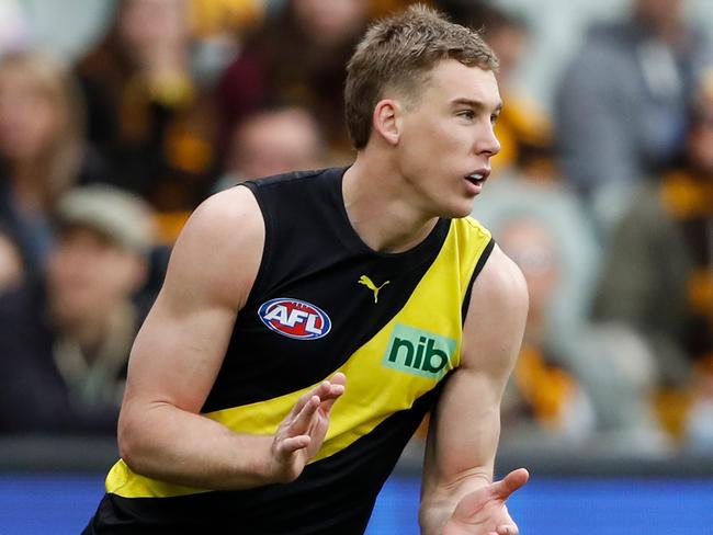 MELBOURNE, AUSTRALIA - AUGUST 14: Tom J. Lynch of the Tigers celebrates a goal during the 2022 AFL Round 22 match between the Richmond Tigers and the Hawthorn Hawks at the Melbourne Cricket Ground on August 14, 2022 in Melbourne, Australia. (Photo by Dylan Burns/AFL Photos via Getty Images)