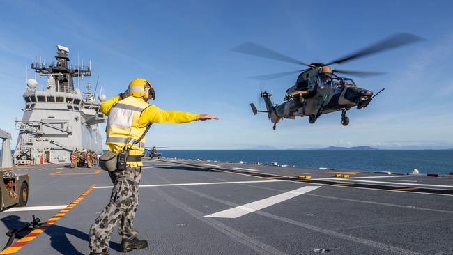 An Australian Army Tiger Armed Reconnaissance Helicopter conducting deck landings on HMAS Canberra, during Exercise Sea Explorer.