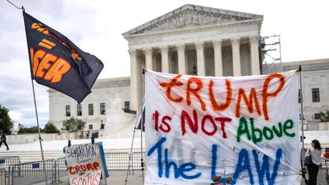 Protesters rally against the Supreme Court decision in front of the court. Picture; AFP.