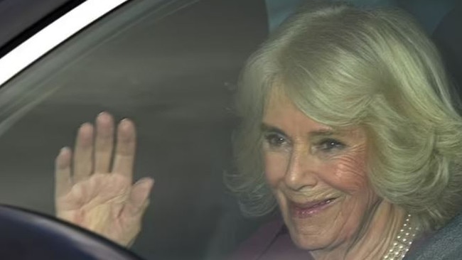 Queen Camilla waves to royal fans as she arrives for the Royal Family's Christmas lunch at Buckingham Palace. Picture: Supplied