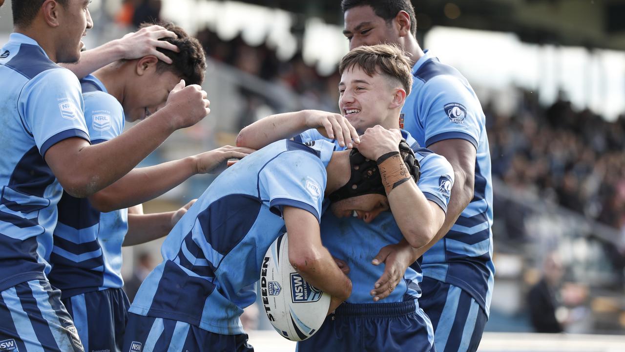 Lance Tevi celebrating his try with teammates during the NSW U15 Combined High Schools v Combined Catholic Colleges, State Rugby League Tri-Series held at St Mary's Leagues Stadium. Picture: Jonathan Ng