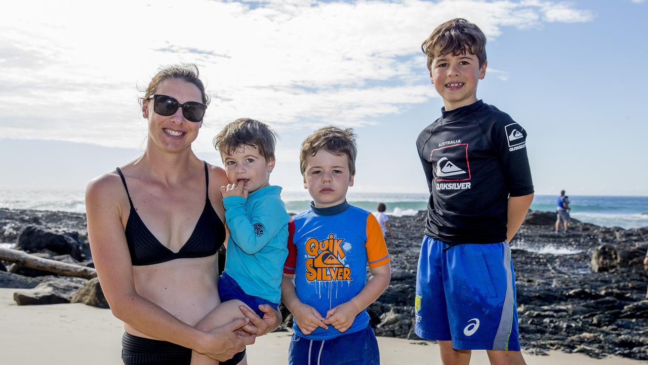 Bri Watkins , Leo Watkins , 2, TedWatkins , 4, and Jack Watkins, 7, at Snapper Rocks. Picture: Jerad Williams