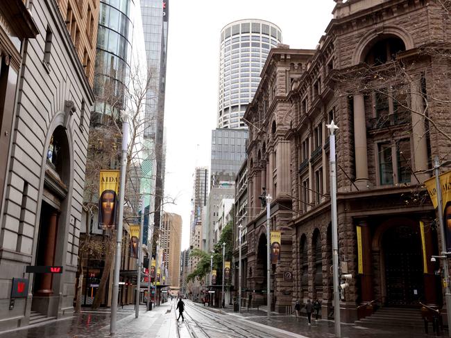 SYDNEY, AUSTRALIA - NewsWire Photos JULY 23, 2021: Morning Peak hour in Sydney's George Street during lockdown.Picture: NCA NewsWire / Damian Shaw