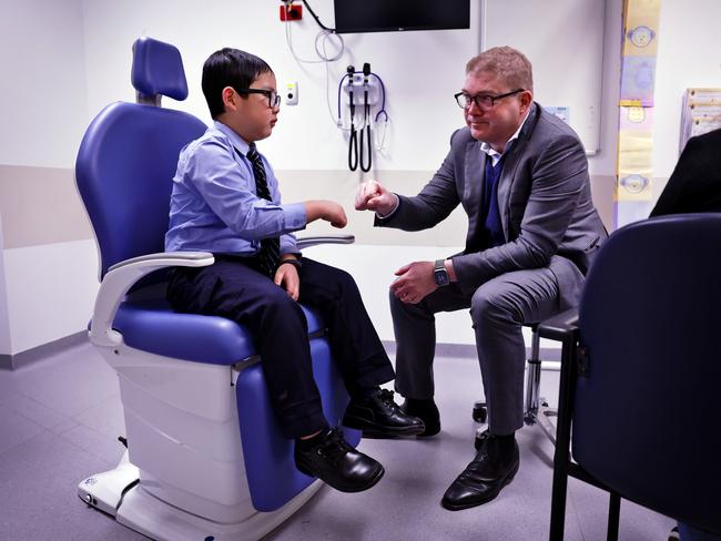 Issac Lee fist pumps Dr Jacob Fairhall at the consultation leading up to his brain surgery.<a capiid="8374c890ab9c912822b18d268c1c830a" class="capi-link"></a>Picture: Sam Ruttyn