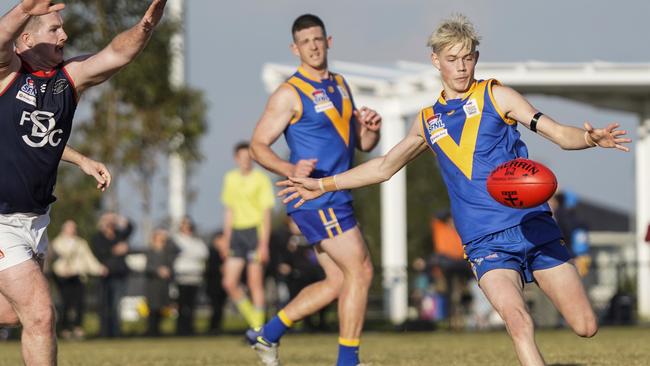 SFNL: Tyson Barry gets a kick for Cranbourne. Picture: Valeriu Campan