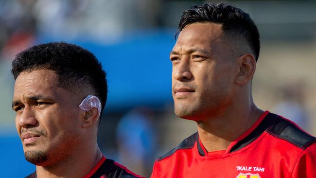 Former Australian rugby player Israel Folau (R). (Photo by Leon LORD / AFP)