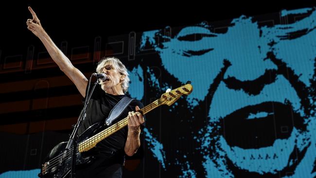 Roger Waters performs in front of a backdrop featuring anti-Trump imagery during his Us + Them tour.  Picture: Kate Izor