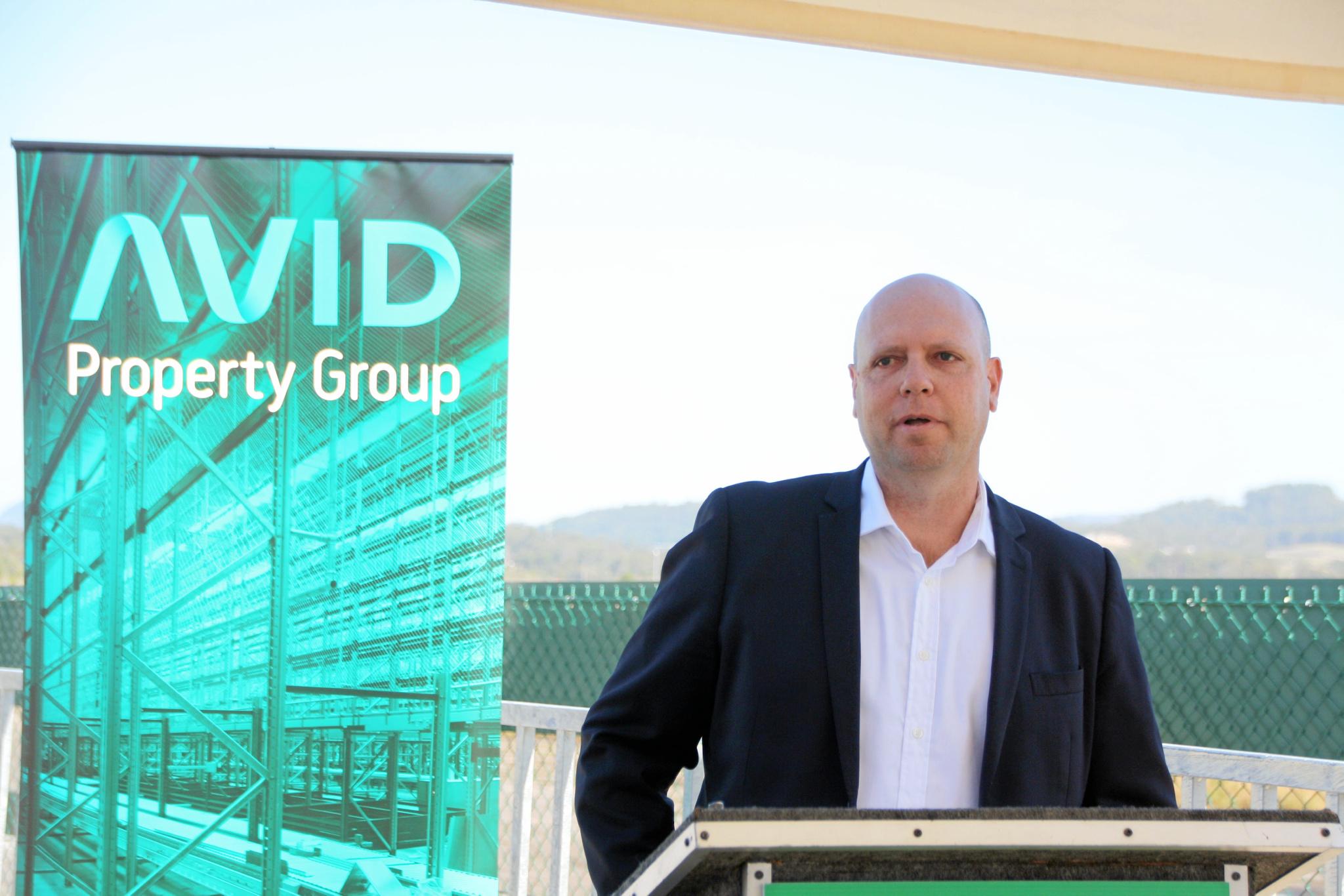 Ben Crosby speaks at the official opening of Peter Crosby Way, the gateway to Palmview's largest master-planned community, Harmony, that has been named after his father. Picture: Erle Levey