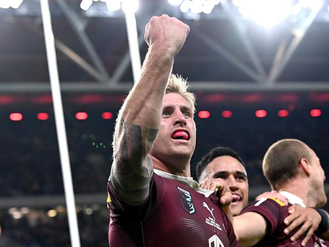 BRISBANE, AUSTRALIA - JUNE 21: Cameron Munster of Queensland celebrates a try by team mate Hamiso Tabuai-Fidow of Queensland during game two of the State of Origin series between the Queensland Maroons and the New South Wales Blues at Suncorp Stadium on June 21, 2023 in Brisbane, Australia. (Photo by Bradley Kanaris/Getty Images)