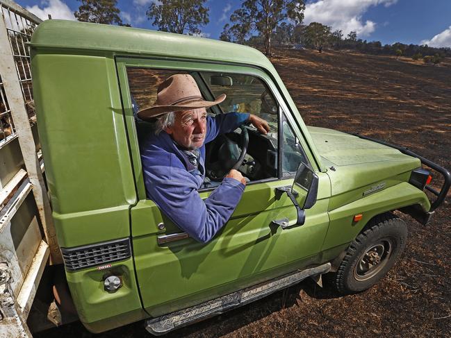 Local resident and farmhand Tex Sonners on a property along Elderslie Road, Pelham, where he had to evacuate live stock when fires raced through the area. Picture: ZAK SIMMONDS