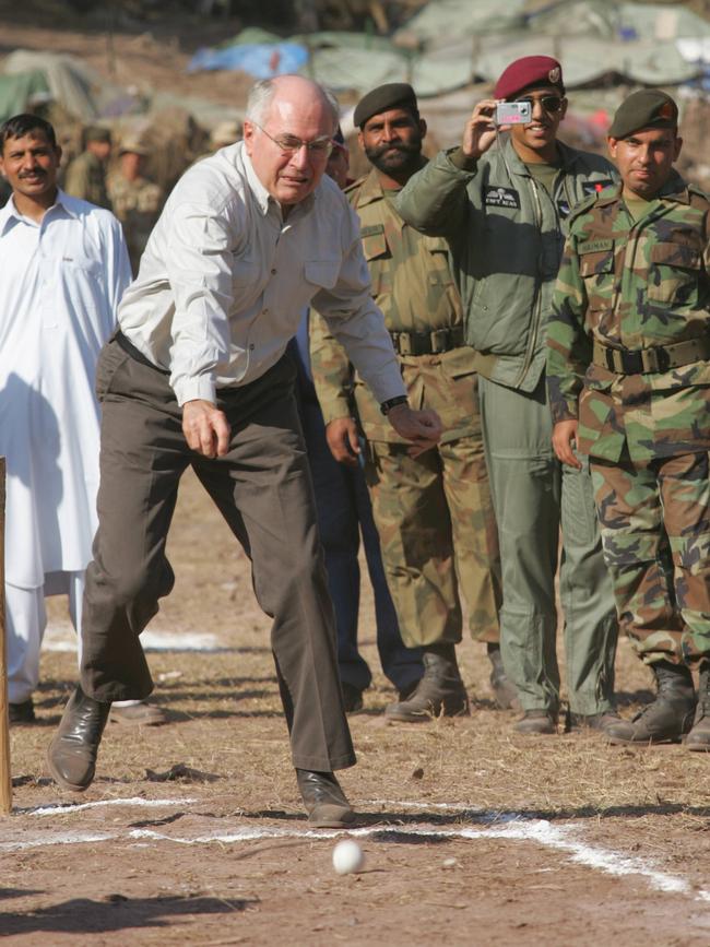 WRONG-UN: Australian Prime Minister John Howard, more of a tragic cricketer than a cricket tragic.