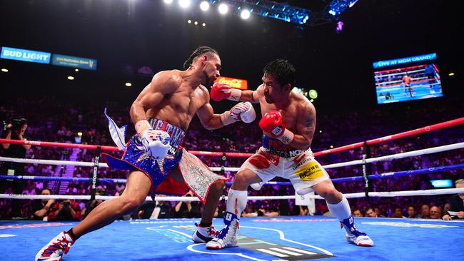 Thurman (left) in his fight against the legendary Manny Pacquiao back in 2019. Photo: Kohjiro Kinno/Sports Illustrated/Getty Images