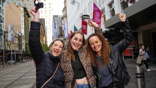 Annie Breene, Lucy Schaefer and Adrienne Schaefer in the Bourke Street Mall as restrictions ease. Picture: Mark Stewart