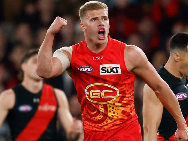 MELBOURNE, AUSTRALIA - AUGUST 10: Jed Walter of the Suns celebrates a goal during the 2024 AFL Round 22 match between the Essendon Bombers and the Gold Coast SUNS at Marvel Stadium on August 10, 2024 in Melbourne, Australia. (Photo by Michael Willson/AFL Photos via Getty Images)