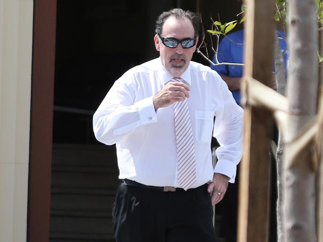 People  leaving a Gold Coast city Council building in Nerang St Southport after attending meeting with Gold Coast Mayor Tom Tate. Photo of Wayne Moran Mayor Chief of Staff. Picture Mike Batterham