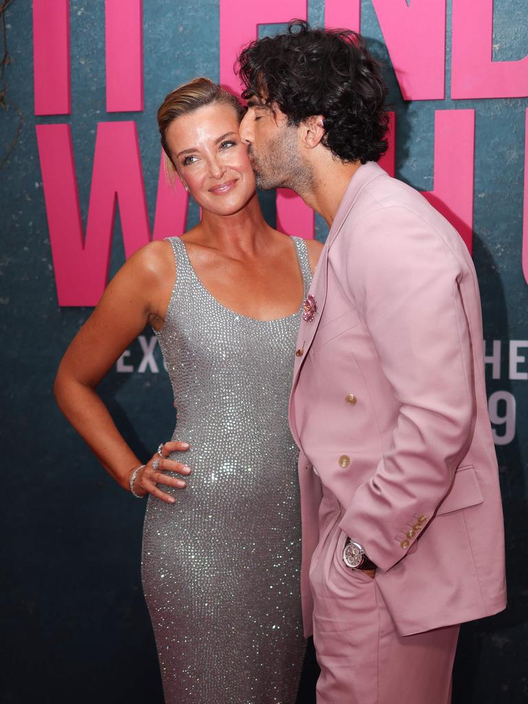 Justin Baldoni kisses his wife Emily Baldoni. Picture: AFP.