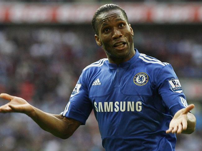 Chelsea's Ivory Coast striker Didier Drogba celebrates after scoring a goal during the FA Cup semi-final football match against Aston Villa at Wembley Stadium, London, on April 10, 2010. AFP PHOTO/GLYN KIRK FOR EDITORIAL USE ONLY Additional licence required for any commercial/promotional use or use on TV or internet (except identical online version of newspaper) of Premier League/Football League photos. Tel DataCo  44 207 2981656. Do not alter/modify photo.