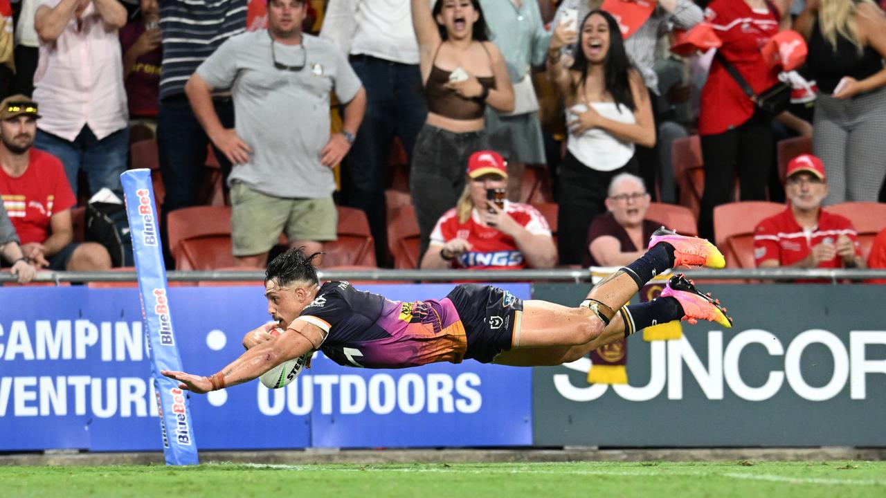 Kotoni Staggs clinches the first derby win for the Broncos. Picture: AAP Image/Darren England