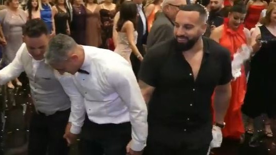 Jimmey Barkho busts a move at a wedding in Melbourne's northern suburbs.