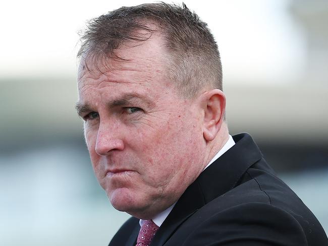 SYDNEY, AUSTRALIA - AUGUST 10: Trainer John O'Shea looks on after Jett Stanley riding Awesome Wonder wins Race 4 TAB during Sydney Racing at Royal Randwick Racecourse on August 10, 2024 in Sydney, Australia. (Photo by Jeremy Ng/Getty Images)