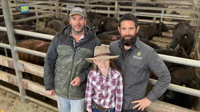 Adrian Nethercote, of Nethercote Trading at Flynn, right, with daughter Mia, 10 and neighbour and fellow cattle breeder Marshall Dean. Picture: Petra Oates