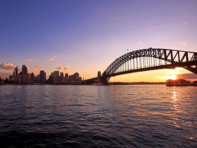 The Sydney Harbour Bridge is pictured at sunset. Picture: Nicholas Eagar