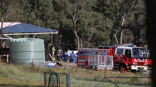 Fire crews and forensic officers can be seen entering the property. Picture: NewsWire / Dean Marzollla