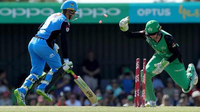 Strikers’ Alex Carey makes his ground as Peter Handscombe of the Stars removes the bails in the BBL clash in Moe on Wednesday. Picture: Mark Dadswell/AAP