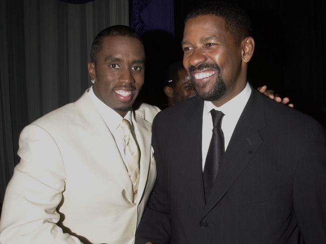 Combs and Washington backstage at the Essence Awards at Madison Square Garden in New York City in 2001. Picture: KMazur/WireImage