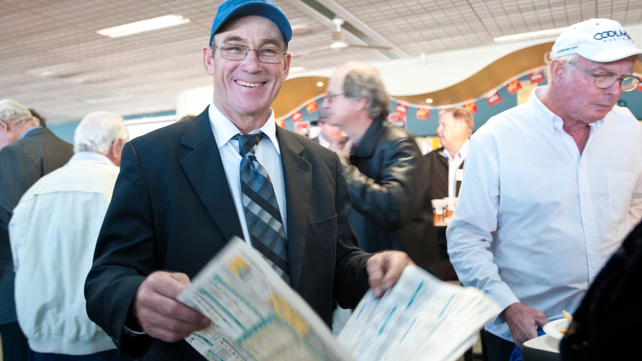 Local trainer Phil Minter checks the form guide. Picture: Rob Wright/The Coffs Coast Advocate