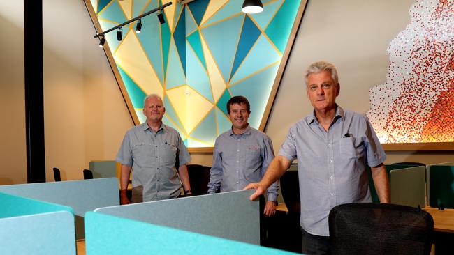 Art Work Spaces owners Mark and Paul Kamsler with manager Gregor Davie, centre, in one of the office spaces for the opening of Art Work Spaces. Picture: Stewart McLean