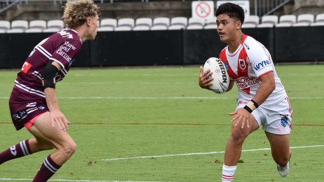 Jayden Rawson runs at Cooper Elkins. Picture: Sean Teuma. NSWRL Junior Reps. Harold Matthews Cup round two, St George Dragons vs Manly Sea Eagles at Jubilee Oval, 10 February 2024