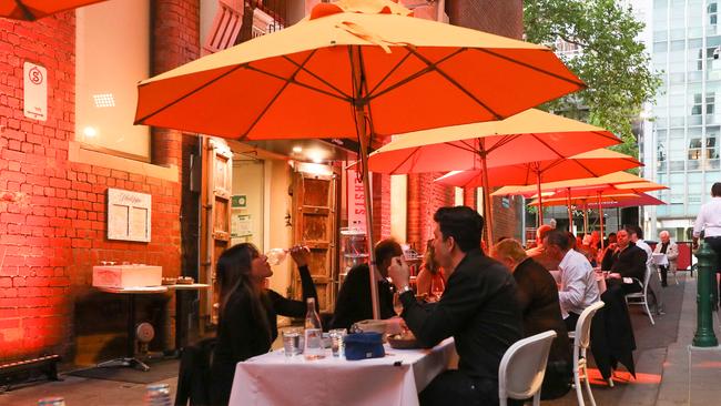 Melbourne restaurantgoers dining outdoors during New Year’s Eve. Picture: Asanka Ratnayake/Getty Images