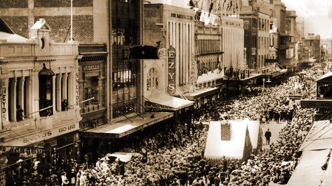 That’s a lot of front. A huge crowd gathers in front of John Martin’s in in Rundle Street for first Christmas Pageant in 1933.