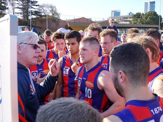 Borough coach Gary Ayres at the three-quarter time huddle. Pic: Jenny Tserkezidis