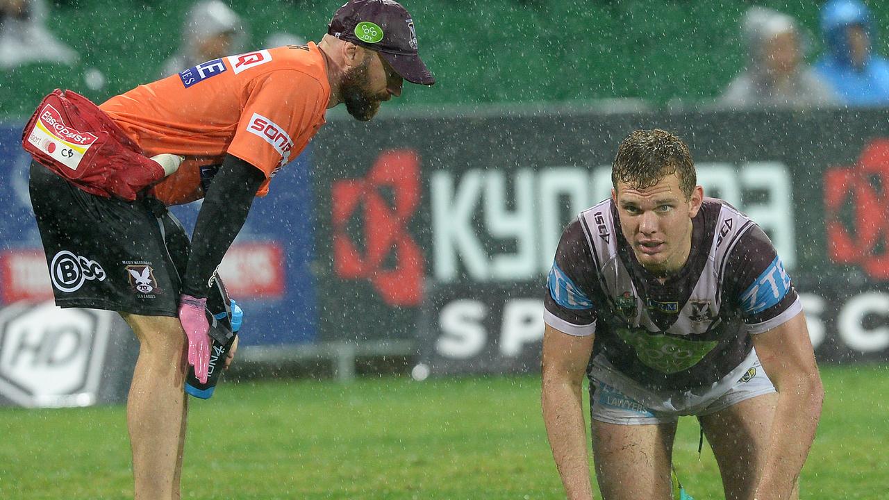 NRL - Manly Sea Eagles vs New Zealand Warriors, nib Stadium, Perth. Photo by Daniel Wilkins. PICTURED- Manly's Tom Trobjevic in the hands of the trainer at the end of the second half