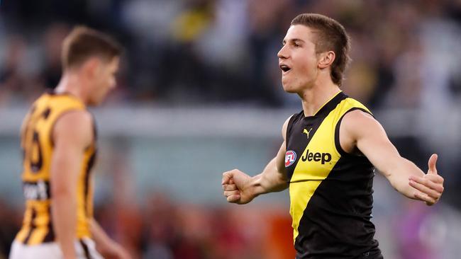 Liam Baker is pulling off his mullet with promising on-field form. Pic. Michael Willson/AFL Photos)