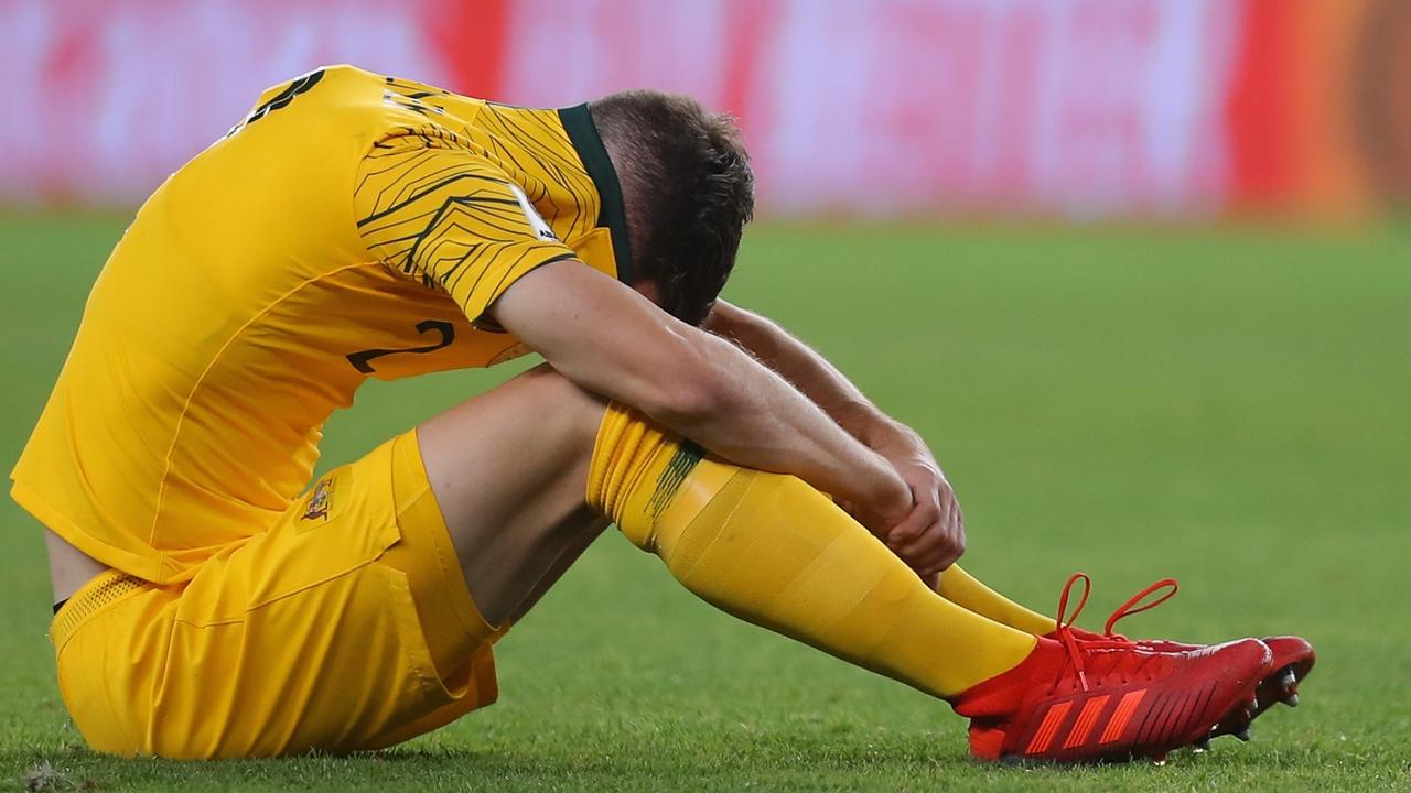 AL AIN, UNITED ARAB EMIRATES - JANUARY 25:  Milos Degenek of Australia looks dejected after  the AFC Asian Cup quarter final match between United Arab Emirates and Australia at Hazza Bin Zayed Stadium on January 25, 2019 in Al Ain, United Arab Emirates.  (Photo by Francois Nel/Getty Images)