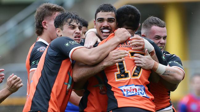 SG Ball football Wests Tigers versus Newcastle Knights at Balmain today with Balmain winning 26-22. Tigers celebrate a try by number 17, Sione Vaihu. Picture: David Swift