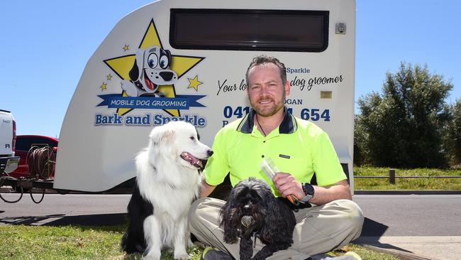 Number 6: Ryan Hogan from Bark & Sparkle Dog Groomers, Mernda, with his dogs Hero the border collie and Jericho the cavoodle. Picture: Josie Hayden