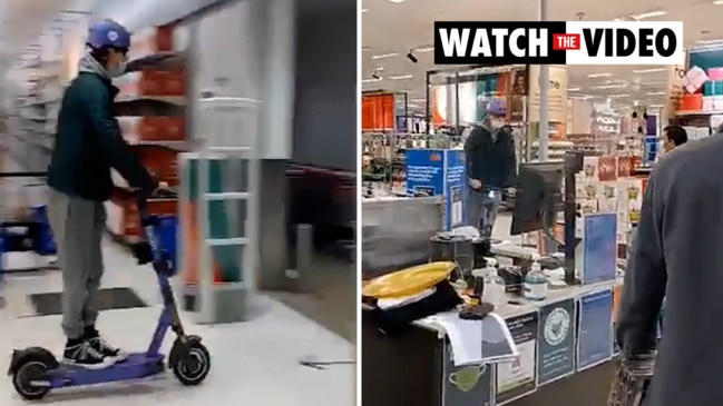 Man rides e-scooter through New Town Plaza Shopping Centre