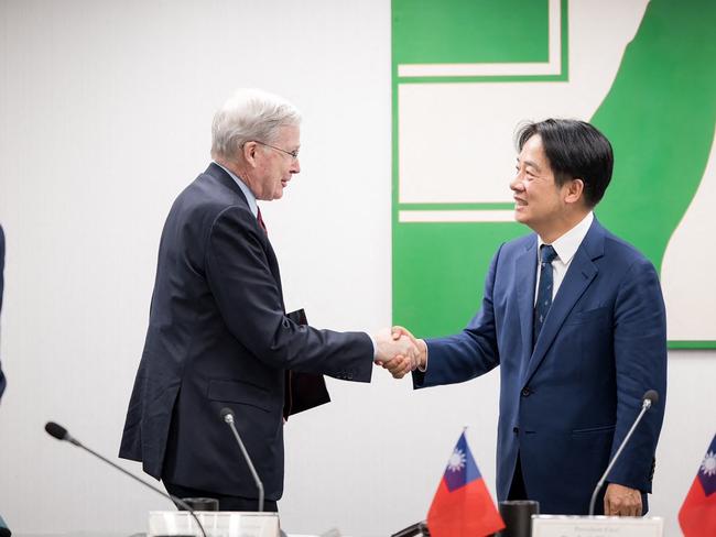 This handout from the Democratic Progressive Party (DPP) taken and released on January 15, 2024 shows Taiwan's President-elected Lai Ching-te (R) shaking hands with former US national security advisor Stephen Hadley during a meeting with an unofficial US delegation at the Presidential Office in Taipei. (Photo by Taiwan's Democratic Progressive Party (DPP) / AFP) / -----EDITORS NOTE --- RESTRICTED TO EDITORIAL USE - MANDATORY CREDIT "AFP PHOTO / Taiwan's Democratic Progressive Party (DPP) " - NO MARKETING - NO ADVERTISING CAMPAIGNS - DISTRIBUTED AS A SERVICE TO CLIENTS - NO ARCHIVES