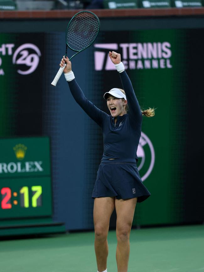 Mirra Andreeva celebrates match point against Iga Swiatek. Photo by CLIVE BRUNSKILL / GETTY IMAGES.