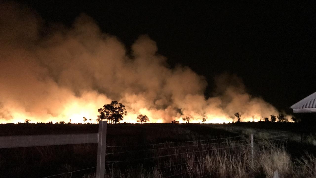 A large scale effort is under way to contain multple fast-moving grass fires west of Kogan.