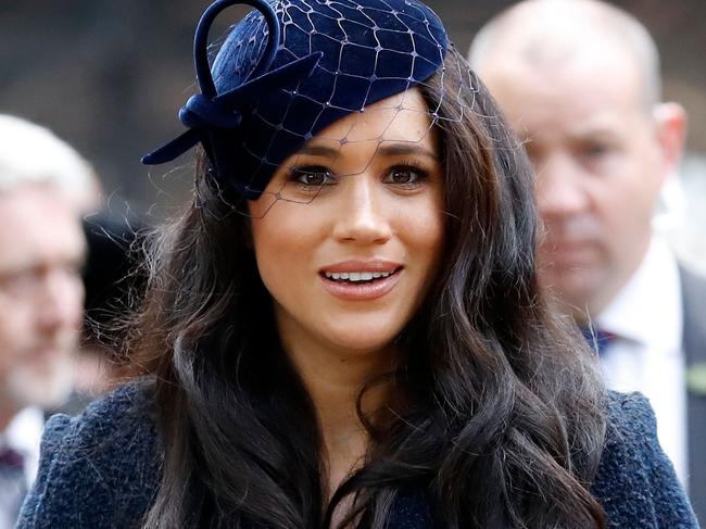 (FILES) In this file photo taken on November 07, 2019 Meghan, Duchess of Sussex leaves after paying her respects during a visit to the Field of Remembrance at Westminster Abbey in central London on November 7, 2019. - Prince Harry's wife Meghan will make an instant start to life away from Britain's royal frontline by narrating a new film about a family of African elephants, Disney announced on Thursday. (Photo by Tolga AKMEN / AFP)