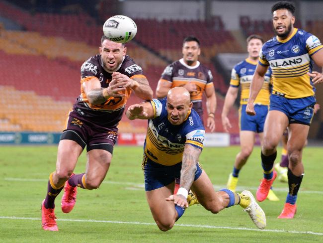 Darius Boyd fumbles the ball over the tryline on a sloppy night for the Broncos. Pictures: Getty