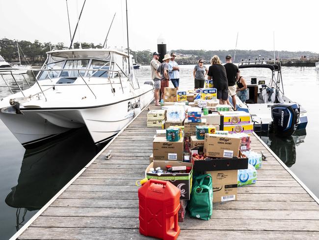 Ulludulla HarbourLocals are using their own boats to take supplies to Bennelong, Manyana, Cunjurong Point and Lake Conjola towns that are isolated due to the fires.Picture's Darren Leigh Roberts