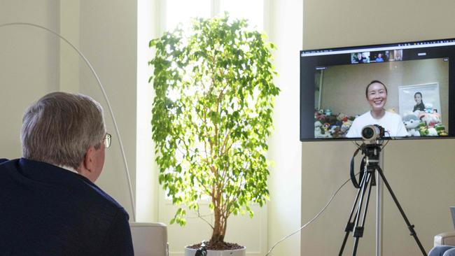 A handout photo posted on the International Olympic Committee website shows IOC President Thomas Bach holding a video call with Peng Shuai. Picture: IOC via AFP.