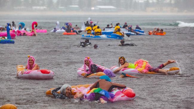 The Manly Inflatable Boat Race at Shelley Beach, Manly, NSW. Sunday 17th March 2019. (AAP IMAGE/Jordan Shields)